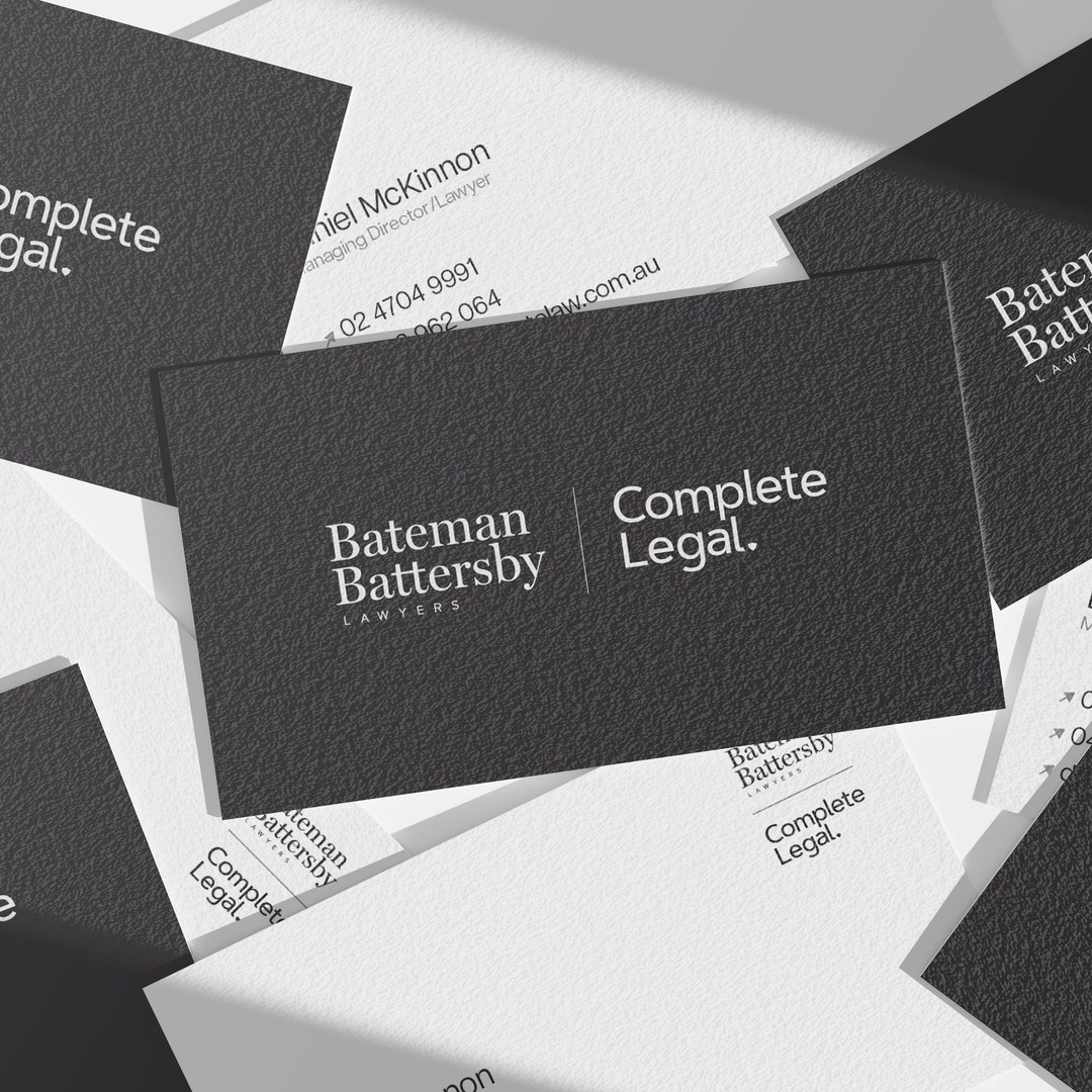 Business cards with the Bateman Battersby | Complete Legal logo on dark and white stock