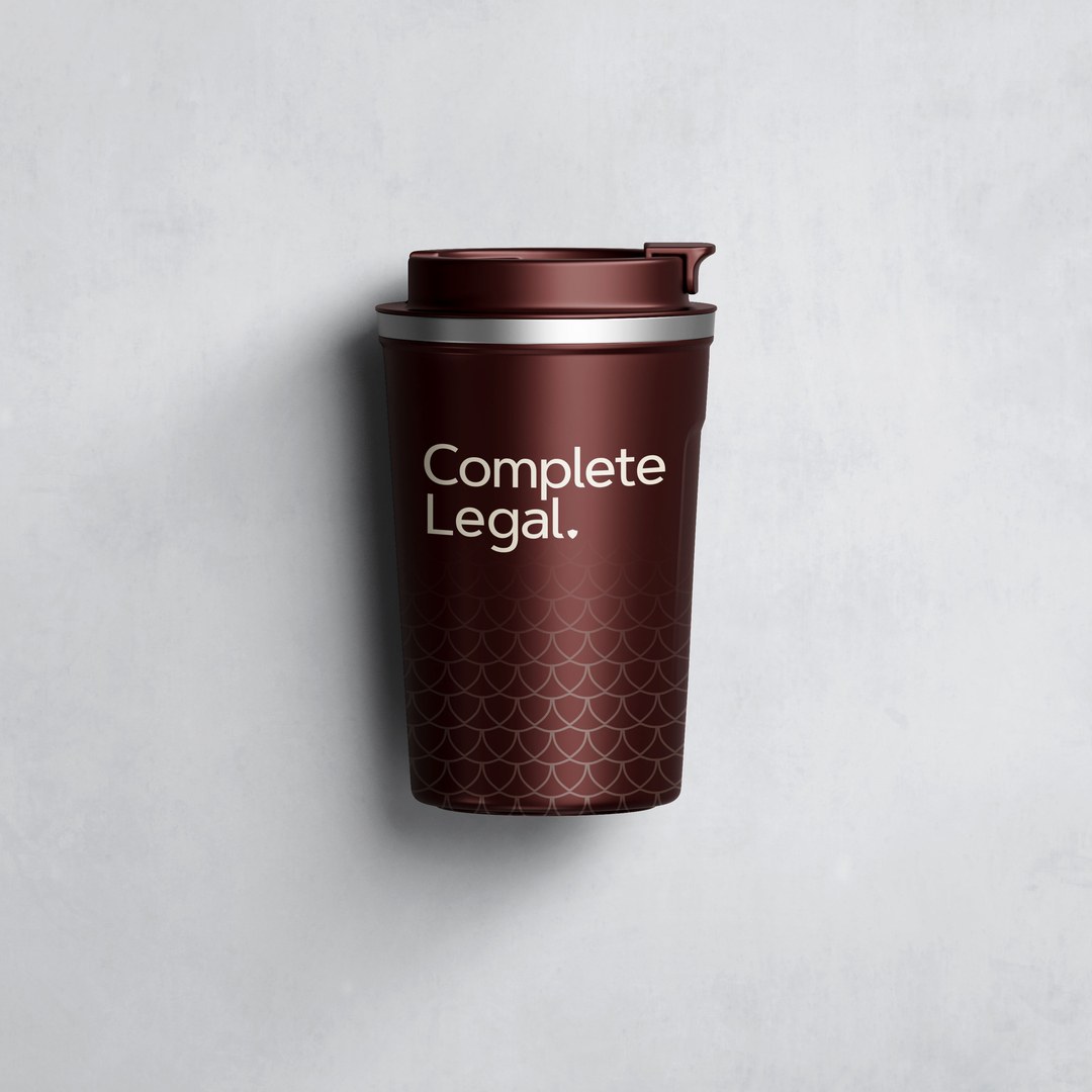 Burgundy travel cup with the Complete Legal logo and a scale pattern
