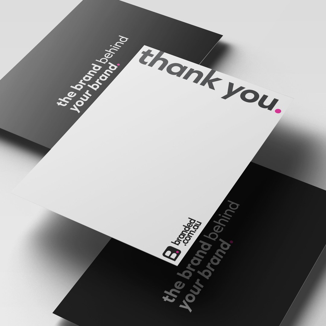 Black and white thank-you cards with the brand line running along the edge