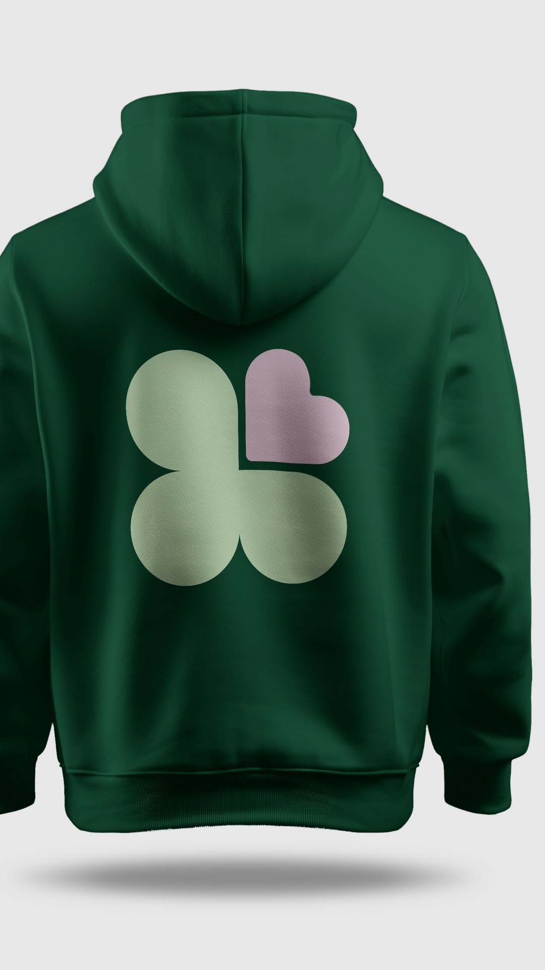 Dark green hoodie with a large clover mark on the back