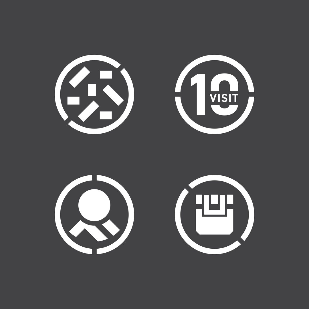 Four round icons, including a ten visit pass, in white on charcoal