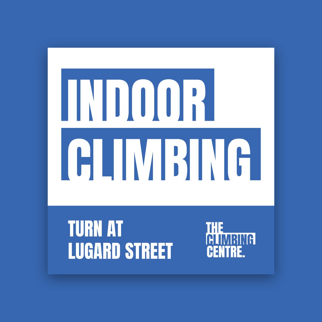 Street sign reading Indoor Climbing, Turn at Lugard Street, with the logo