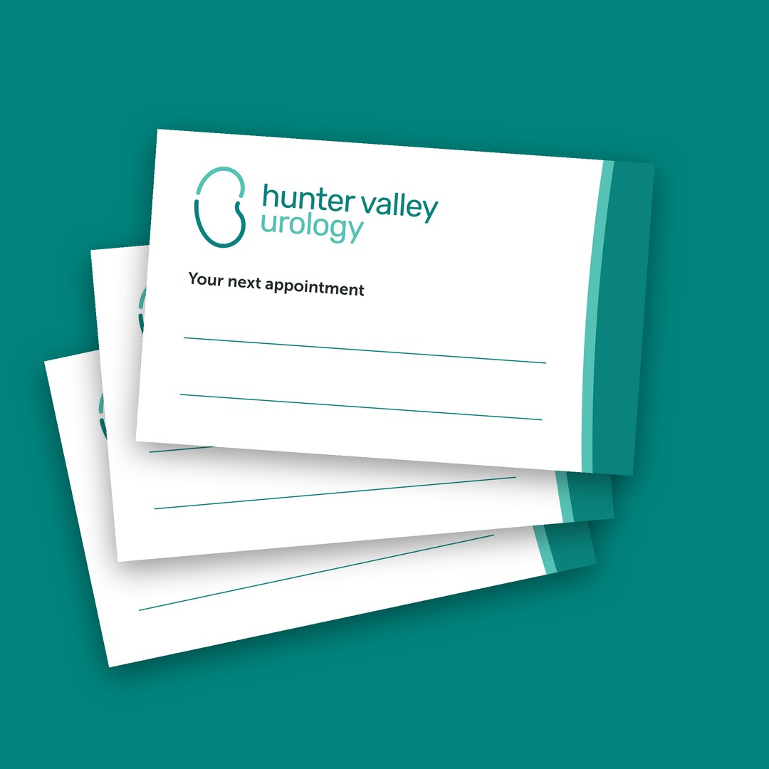 Stack of appointment cards in teal and white
