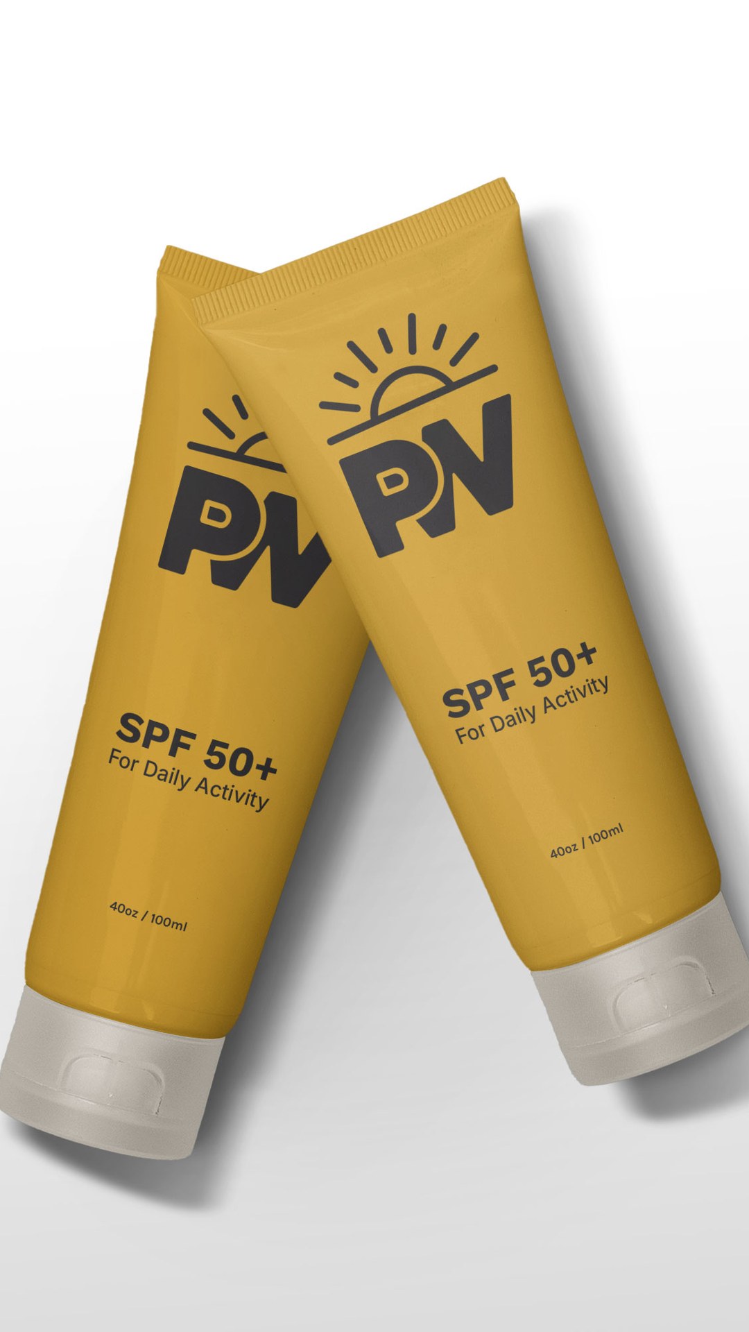Two yellow SPF 50+ sunscreen tubes printed with the PW monogram