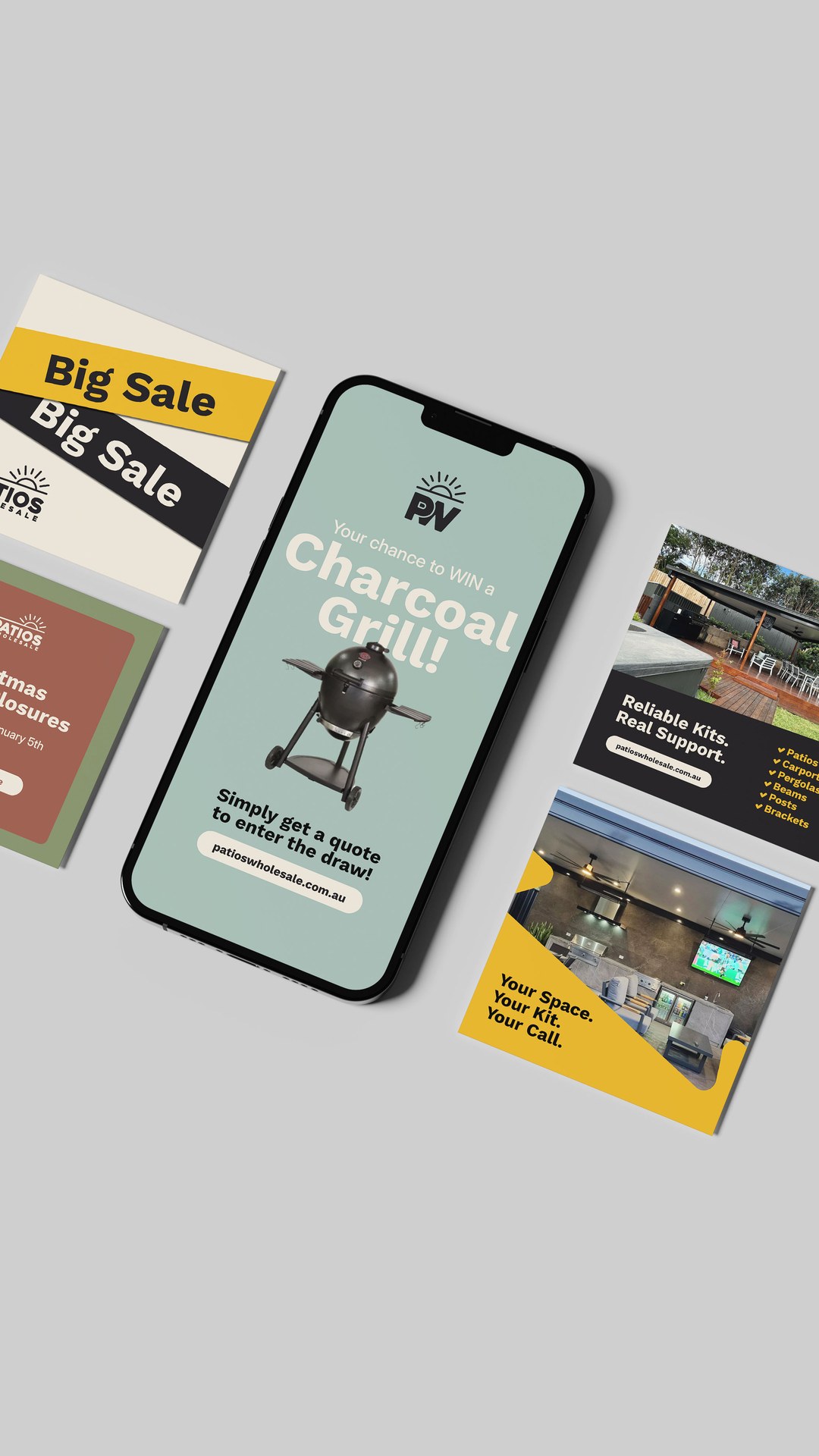 Phone and printed posts for a big sale and a charcoal grill giveaway