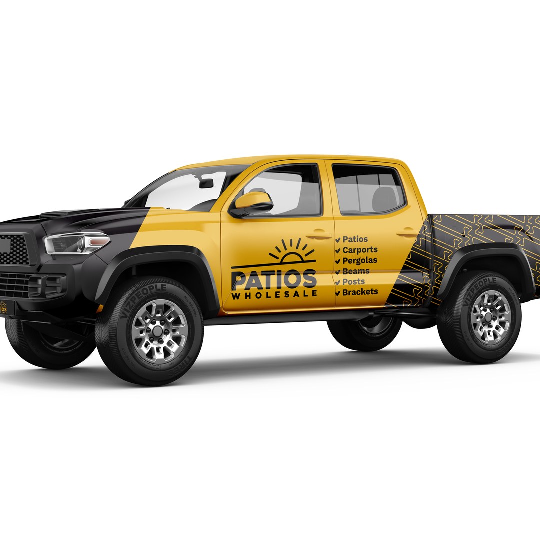 Yellow and black ute wrapped with the Patios Wholesale logo and a list of products